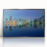 Mid-century modernist art of Miami skyline in pastel shades on silver-framed acrylic, ideal for nursery wall art.