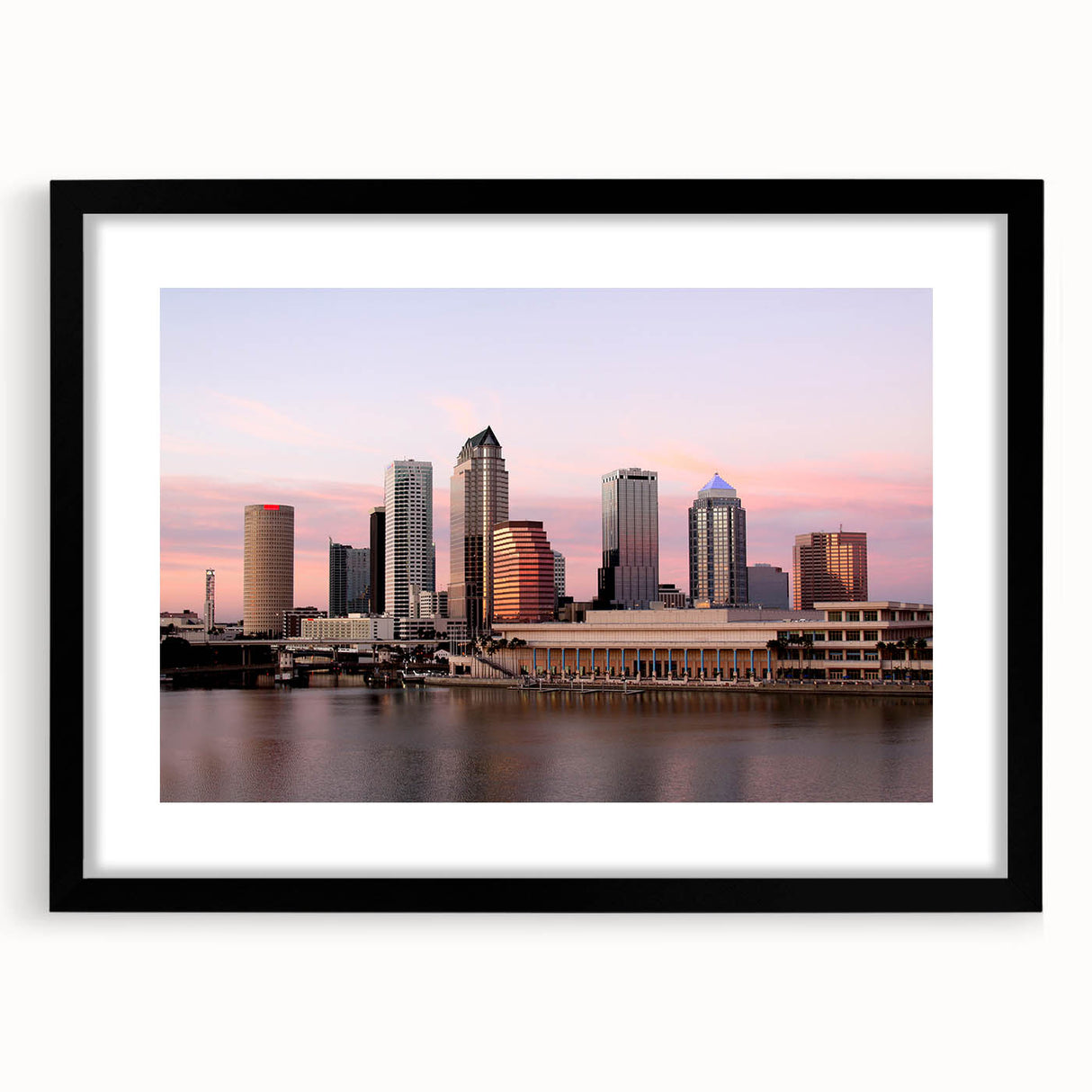 Extra large abstract art print of colorful, textured Tampa scenery on a black framed mat, ideal for living room decor.