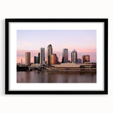 Extra large abstract art print of colorful, textured Tampa scenery on a black framed mat, ideal for living room decor.