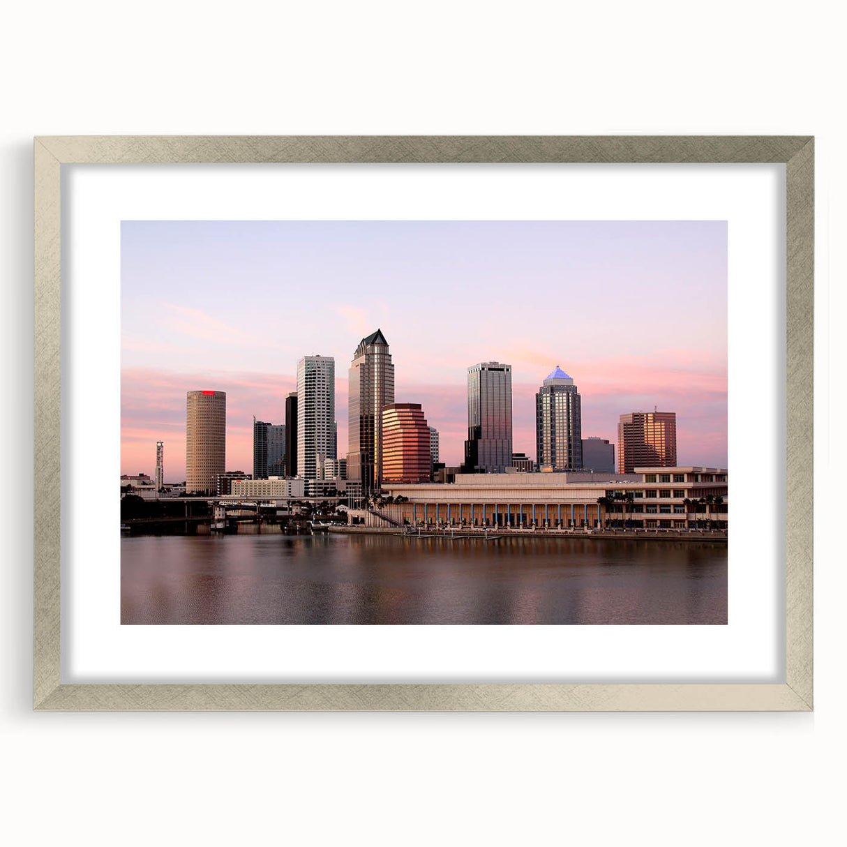 Textured art print of Tampa skyline in abstract style with muted earth tones on a silver-framed mat, ideal for bedroom art.
