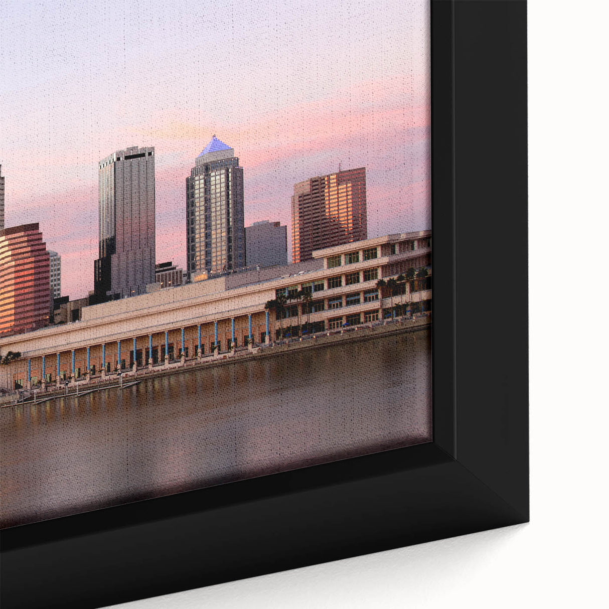 Framed canvas of a textured Tampa skyline in black with colorful accents, ideal for living room decor.