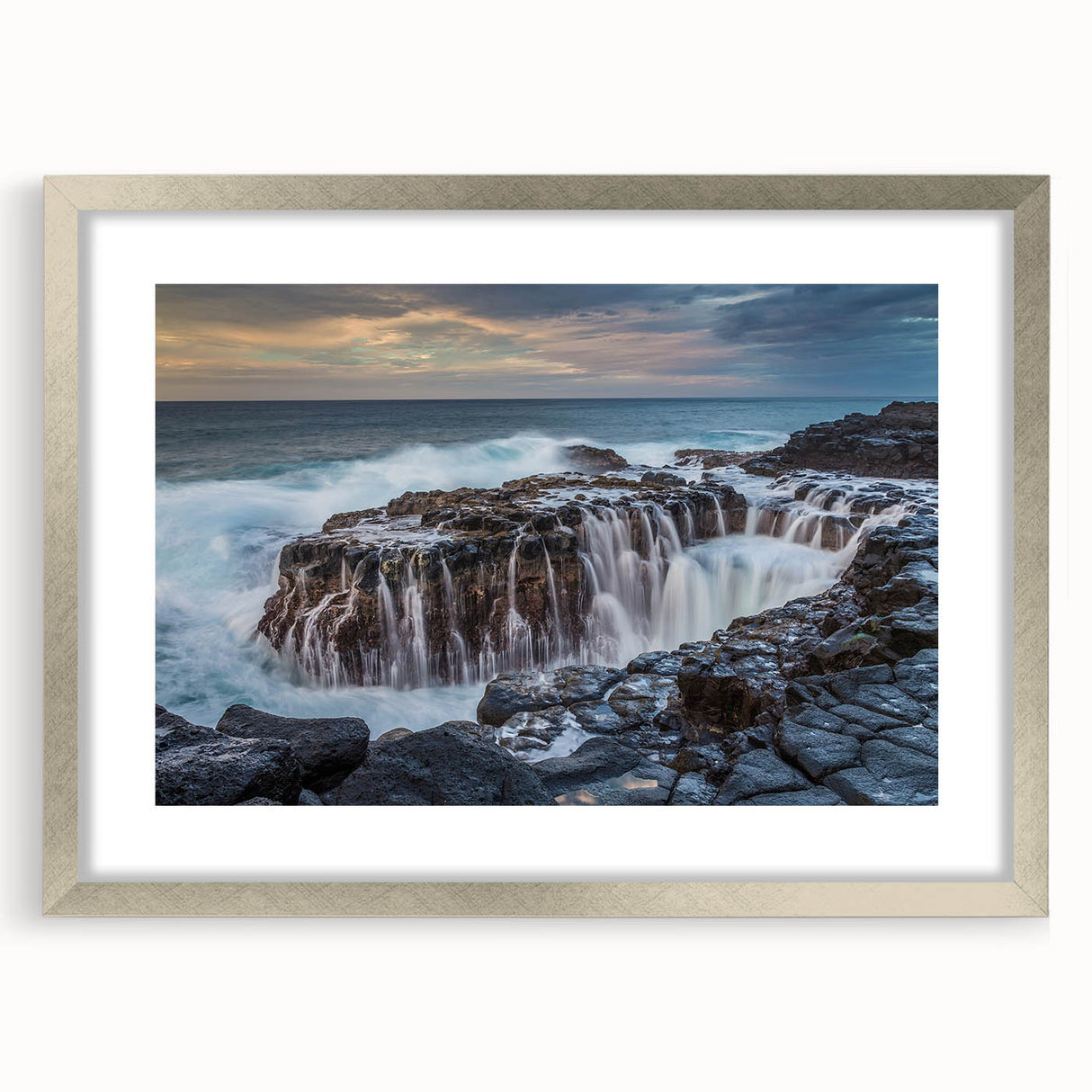 Textured art of abstract Kauai scenery, muted green and blue tones, in a silver frame, ideal for bedroom art.