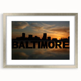 Textured art print of Baltimore skyline in abstract style with gray and blue tones on a framed silver mat.