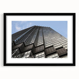 Extra large abstract art print of Minneapolis skyline in vibrant, colorful hues on a black framed canvas.