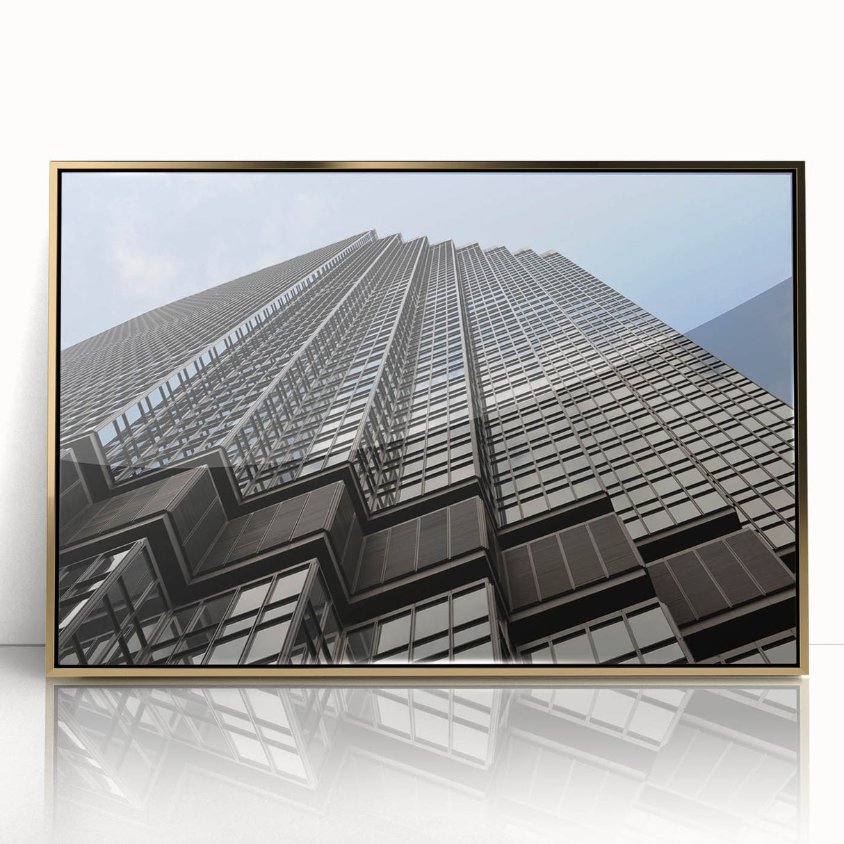 Framed acrylic print of Minneapolis skyline in gold and blue tones, suitable for modern art wall decor.