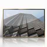 Framed acrylic print of Minneapolis skyline in gold and blue tones, suitable for modern art wall decor.