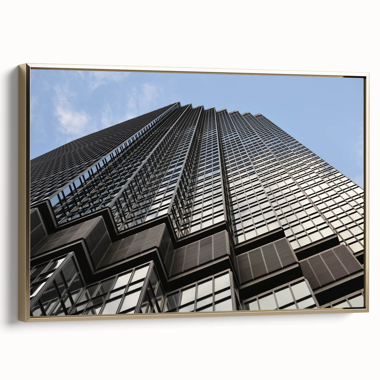 Framed canvas wall art featuring a vintage-style Minneapolis landscape in black and gold tones, suitable for bedroom decor.