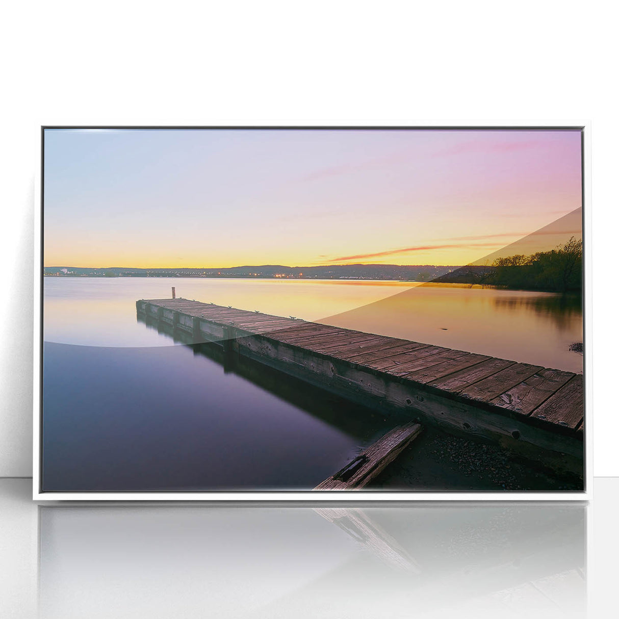 Acrylic print of a serene Minnesota landscape in muted green and blue tones, framed in white.