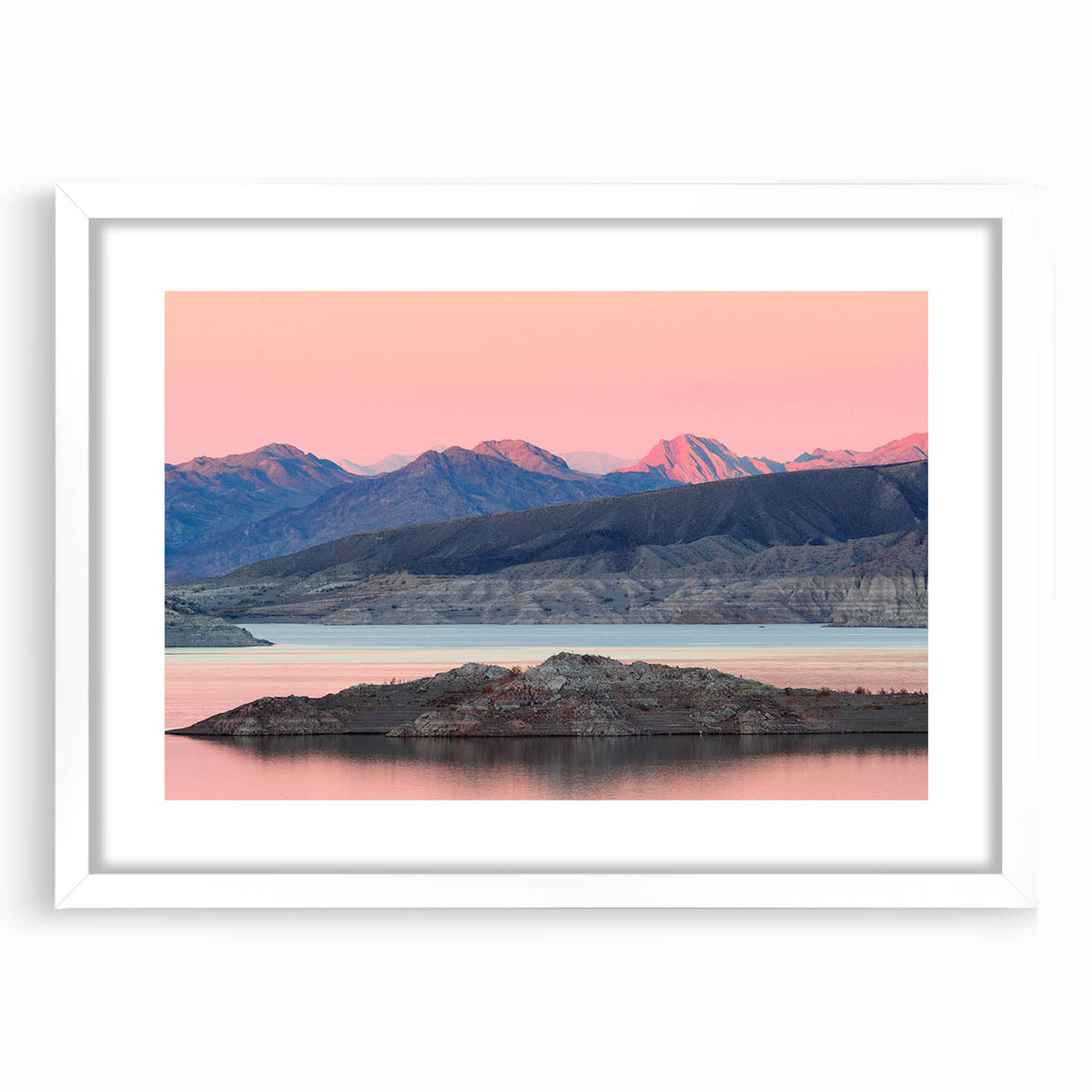Abstract art print of Lake Mead with muted blue and gray tones on a white framed poster, suitable for dining room decor.