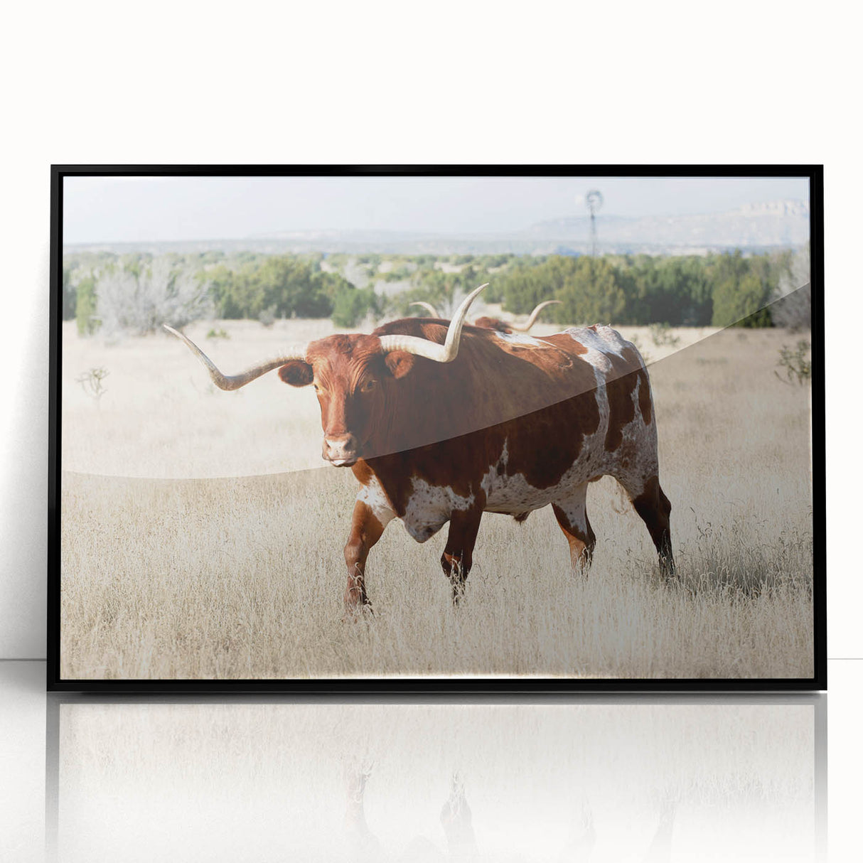 Large abstract wall art depicting New Mexico scenery in earth tones on a framed acrylic, ideal for modern living room decor.