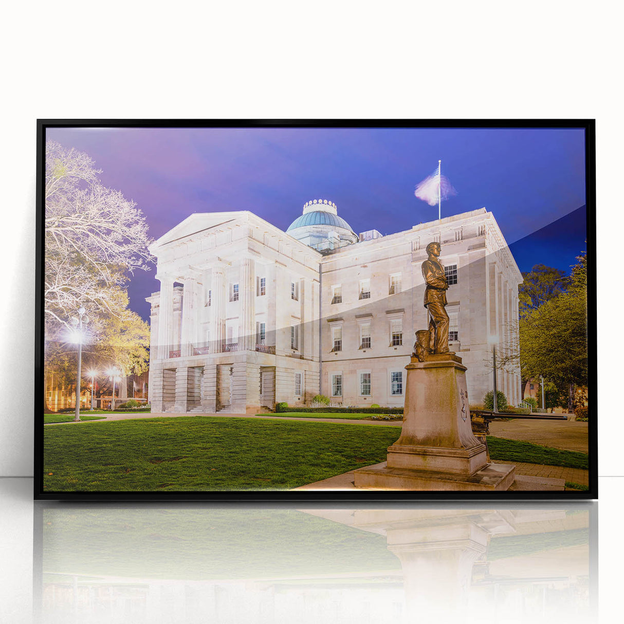 Large abstract wall art depicting Raleigh, North Carolina skyline in muted gray tones on a framed acrylic.