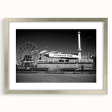 Textured art print of Coney Island in muted blues and grays, framed in silver, ideal for bedroom wall decor.
