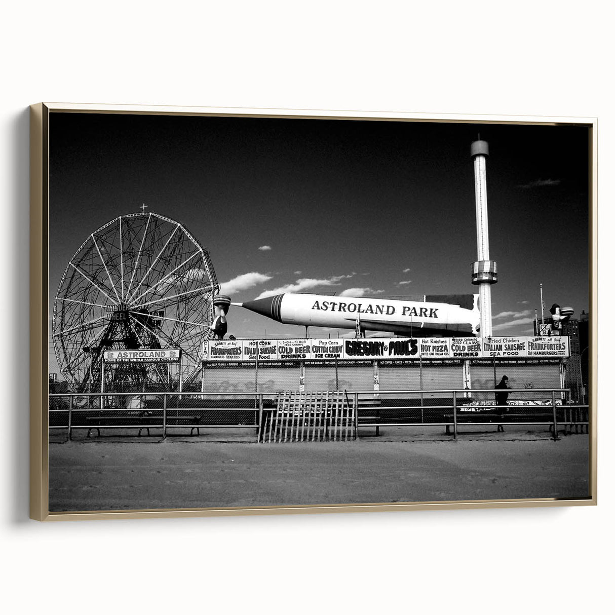 Framed canvas wall art featuring a vintage-style landscape of Coney Island, with a black and gold color scheme.