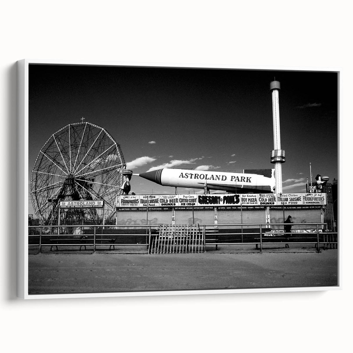 Vintage poster art of Coney Island on a framed canvas, showcasing vibrant colors on a black background.