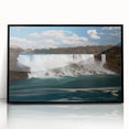 Large abstract wall art of Niagara Falls in muted blue and gray tones, framed in black acrylic.