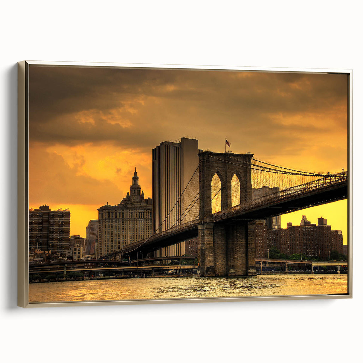 Framed canvas wall art of the Brooklyn Bridge in a vintage poster style, featuring black and gold tones.