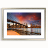 Textured art print of abstract Brooklyn skyline in muted gray tones, framed in silver, ideal for bedroom wall decor.