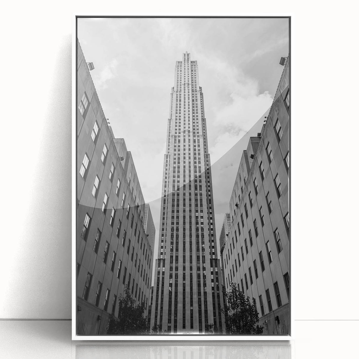 Art deco poster of New York City's Rockefeller Center in black and white, acrylic framed, ideal for modern art wall decor.