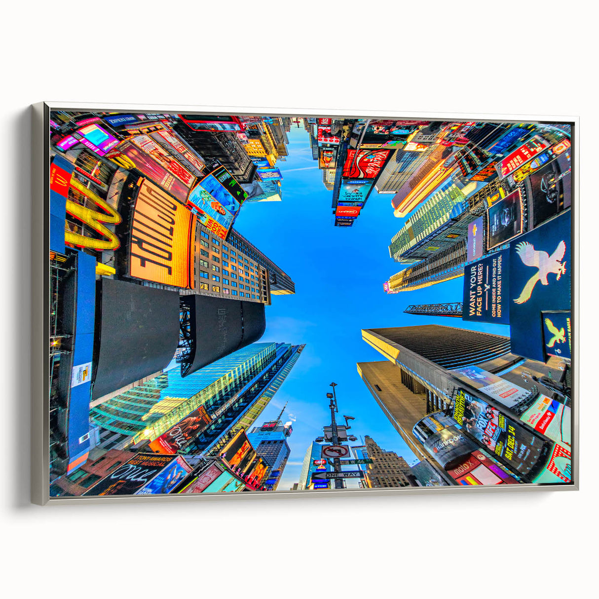 Framed canvas of a colorful Times Square landscape with vintage poster art elements, ideal for living room decor.
