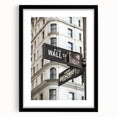 Abstract art print of NYC Wall Street in vibrant colors on a large textured canvas, framed in black.