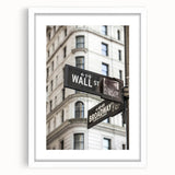 Abstract art print of the NYC Wall Street scene in muted gray and blue tones on a white-framed poster.
