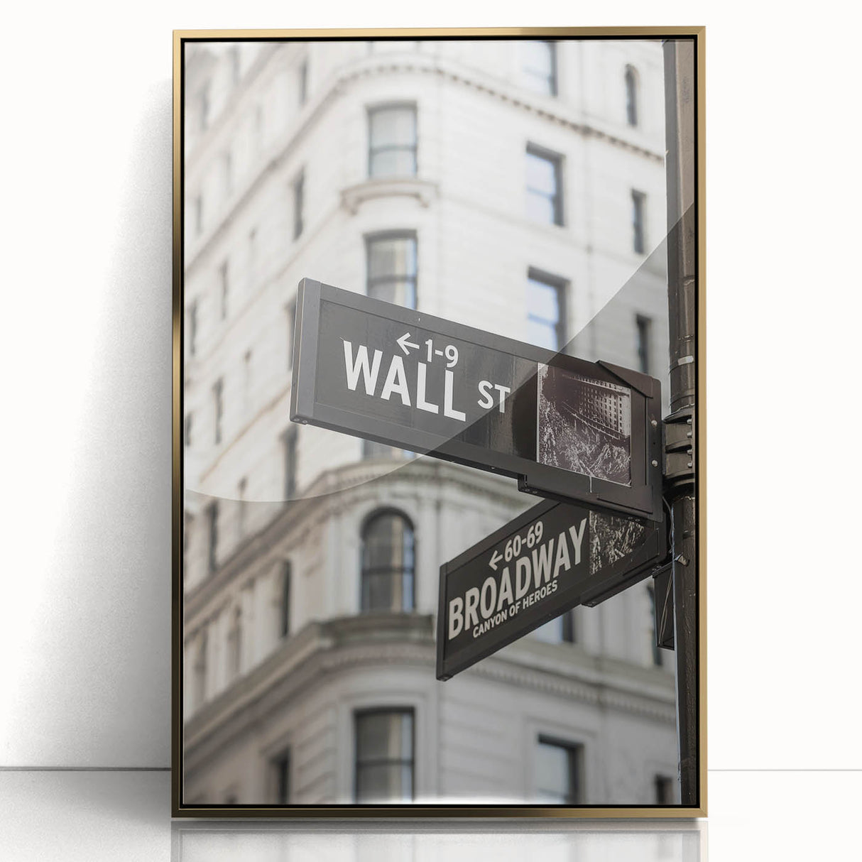 Framed acrylic print of New York City's Wall Street in gold and black tones, ideal for modern art wall decor.