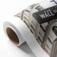 Art deco poster of New York City's Wall Street in black and white tones on rolled canvas.