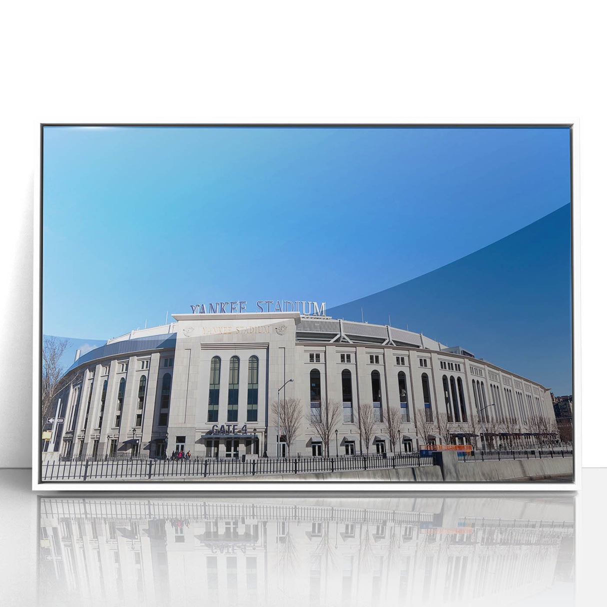 Framed acrylic print of New York City skyline in monochrome tones, ideal for modern art wall decor in a nursery.