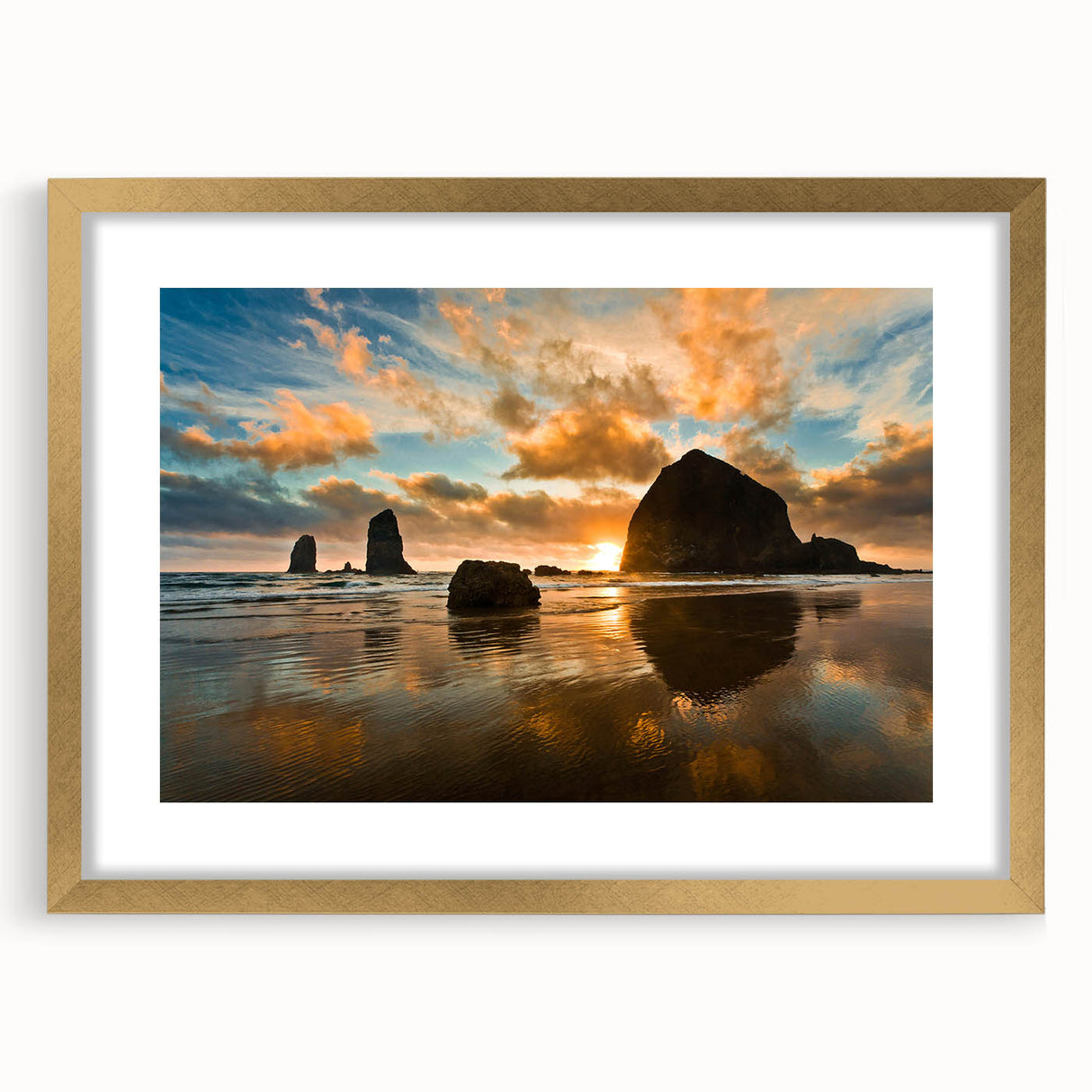 Extra large wall art featuring an abstract print of Cannon Beach in Oregon with textured details, framed in gold.