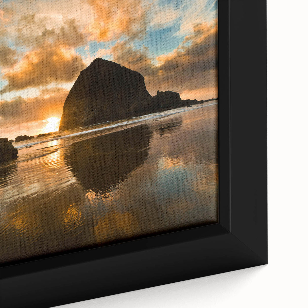 Extra large framed canvas featuring a textured depiction of Cannon Beach, Oregon, in muted black and colorful hues.