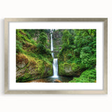 Textured art print of Multnomah Falls in muted green and blue tones, framed in silver, ideal for bedroom wall decor.
