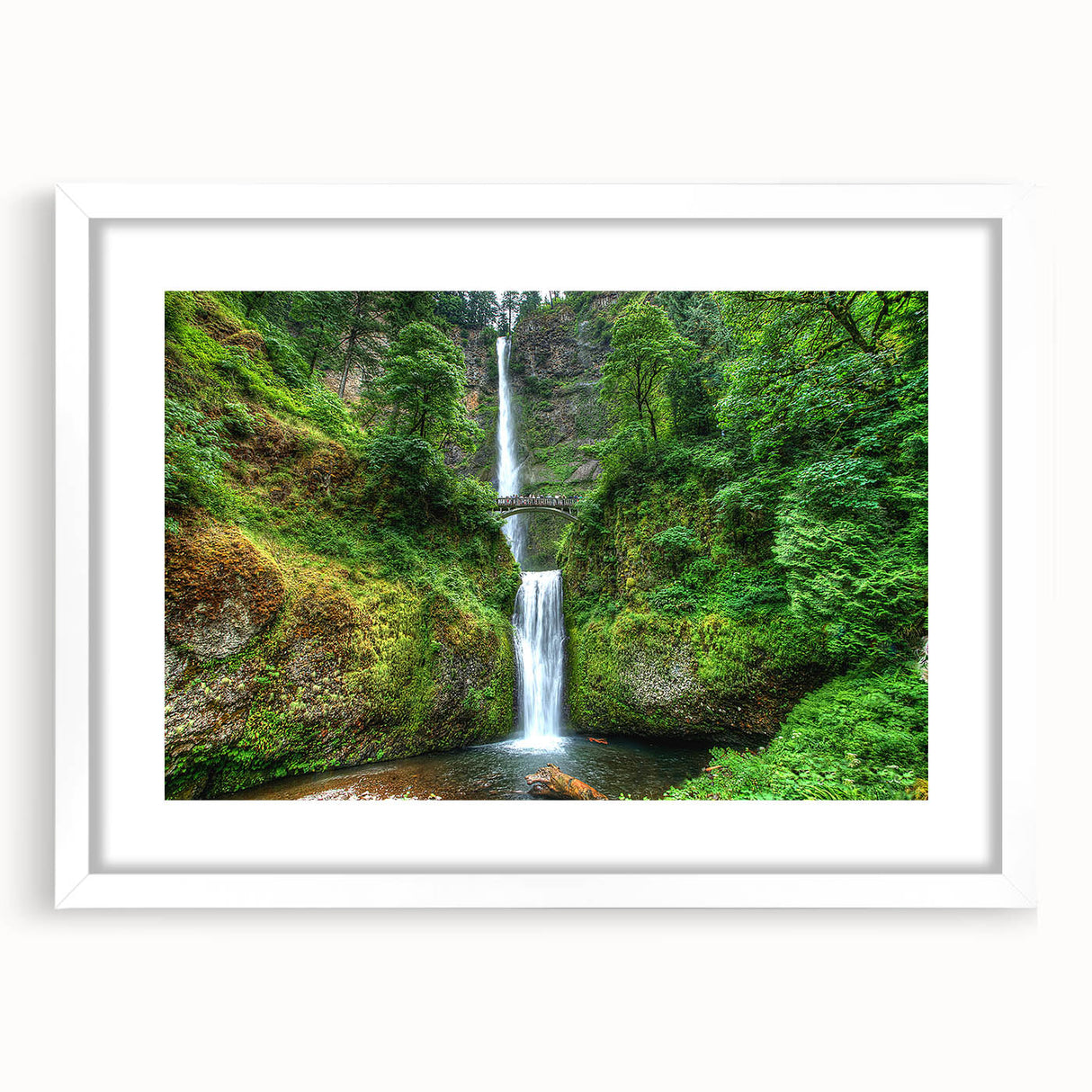 Abstract art print of Multnomah Falls in muted green and blue tones, framed with a white mat, suitable for dining room decor.