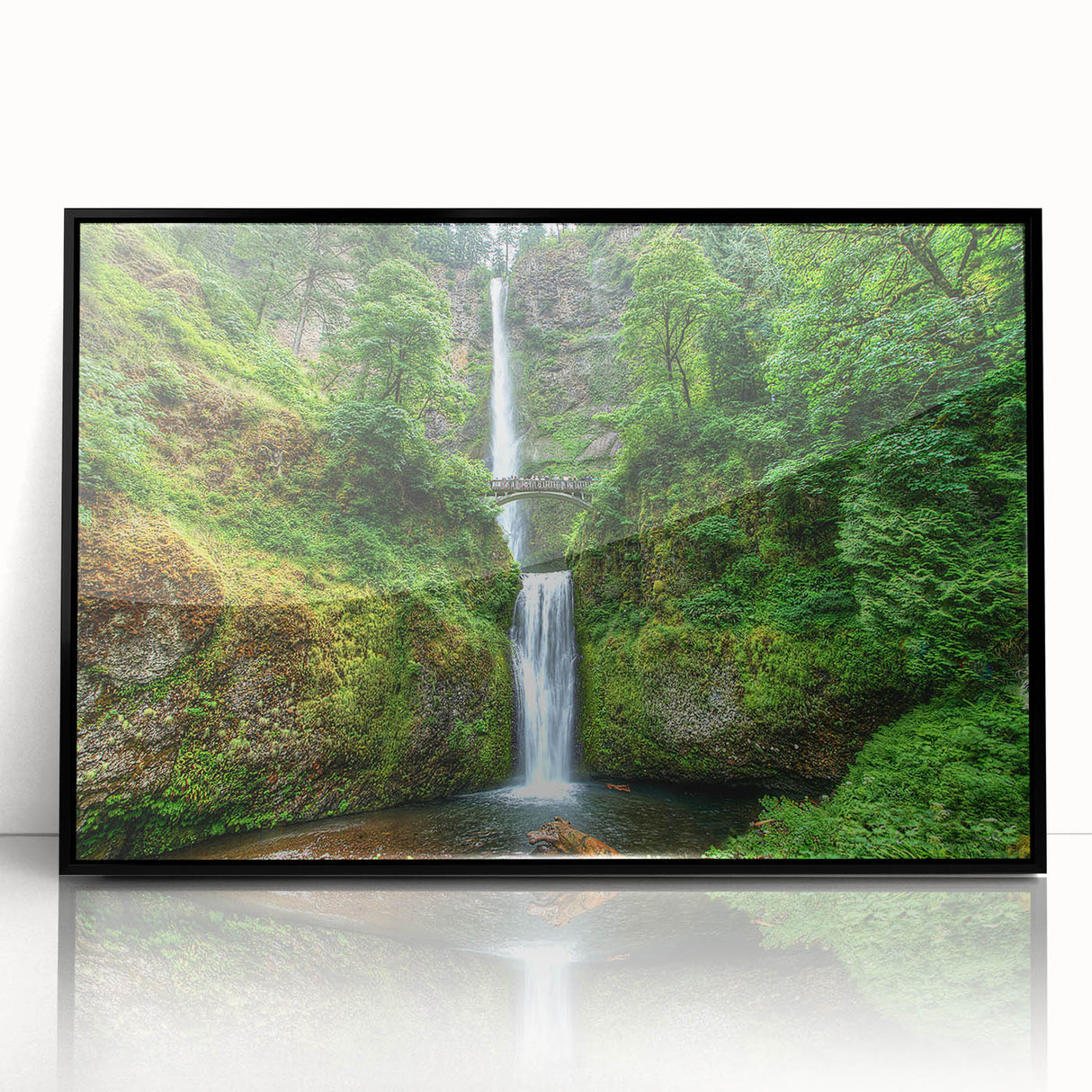 Large abstract wall art featuring Multnomah Falls in muted green and blue tones on a black-framed acrylic.