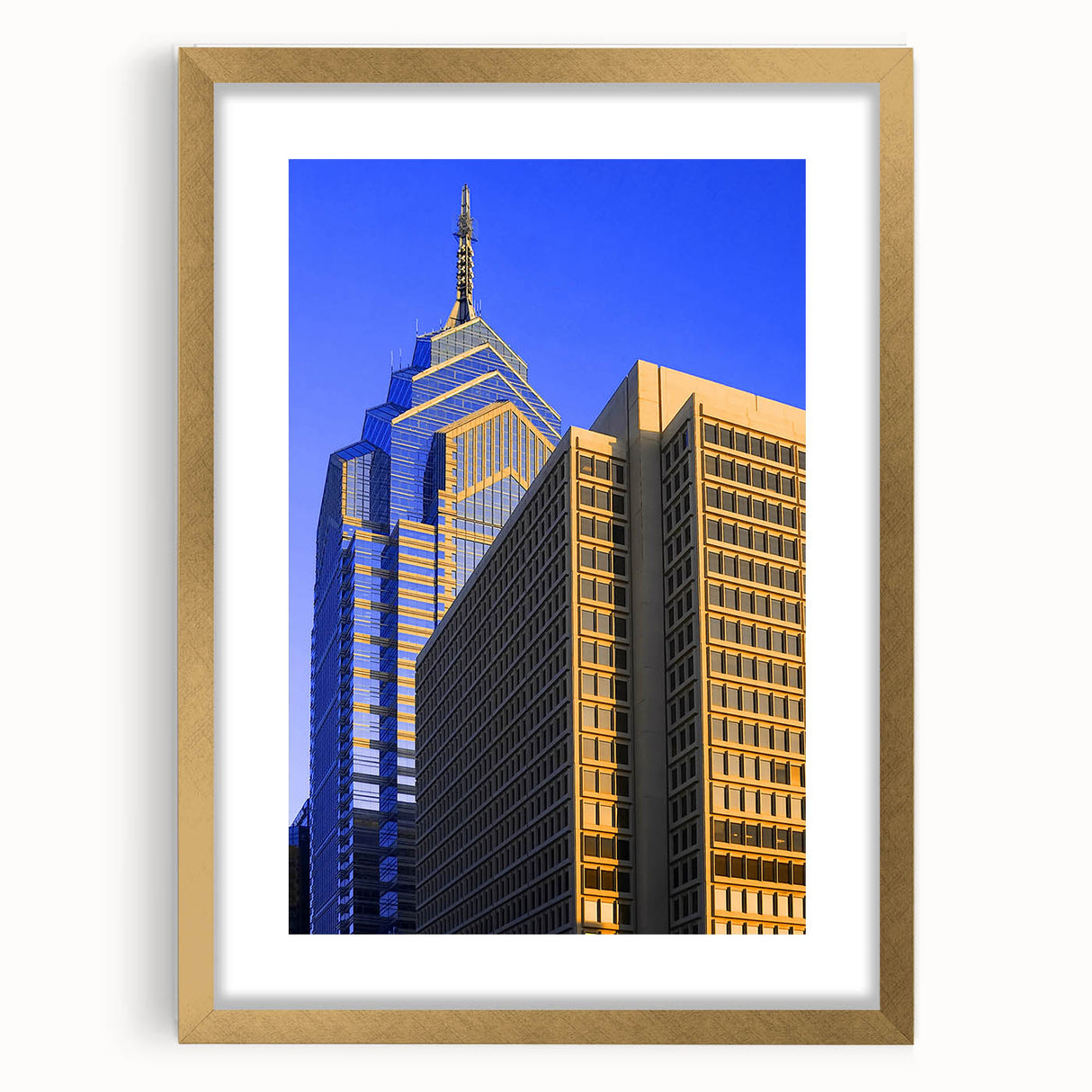 Extra large abstract art print of Philadelphia skyline in textured gold frame, ideal for living room decor.