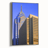 Framed canvas of a vintage-style Philadelphia landscape in muted black with vibrant color accents, ideal for office decor.