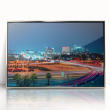 Mid-century modernist art of Phoenix valley in muted earth tones on a silver-framed acrylic print.