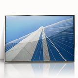 Mid-century modernist art of Charleston, South Carolina skyline in muted blue tones on a silver-framed acrylic print.