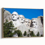 Framed canvas wall art featuring a landscape painting of Mount Rushmore in muted earth tones, ideal for bedroom decor.