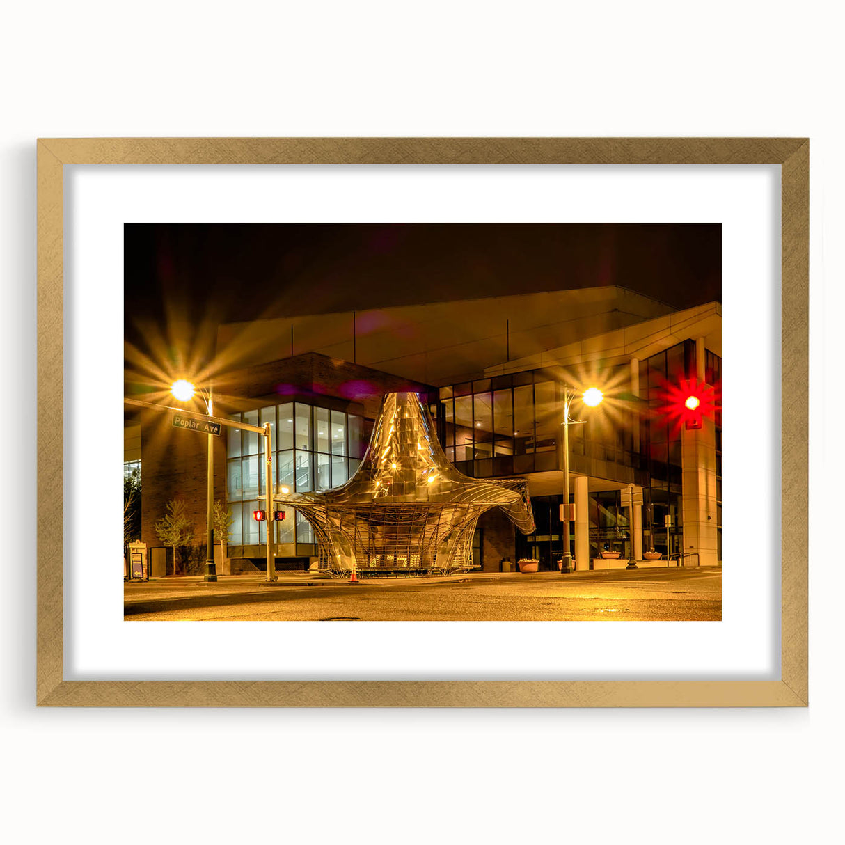 Extra large abstract art print of Memphis scenery in gold frame, featuring textured design in soft earth tones.