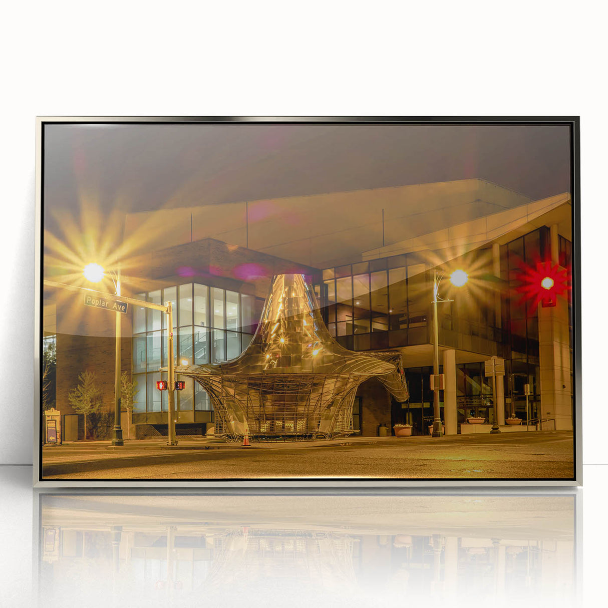 Mid-century modernist art of Memphis skyline in muted gray and blue tones on a silver-framed acrylic print.