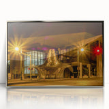 Mid-century modernist art of Memphis skyline in muted gray and blue tones on a silver-framed acrylic print.