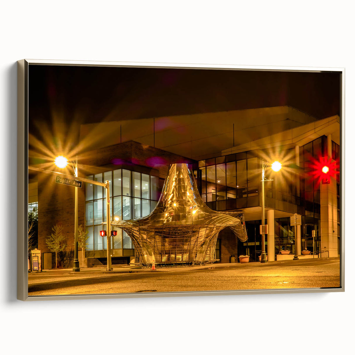 Framed canvas wall art depicting a vintage-style Memphis landscape in gold and black tones, ideal for bedroom decor.