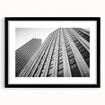 Abstract art print of a colorful Houston skyline with textured brush strokes on a large framed canvas.