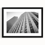 Abstract art print of a colorful Houston skyline with textured brush strokes on a large framed canvas.