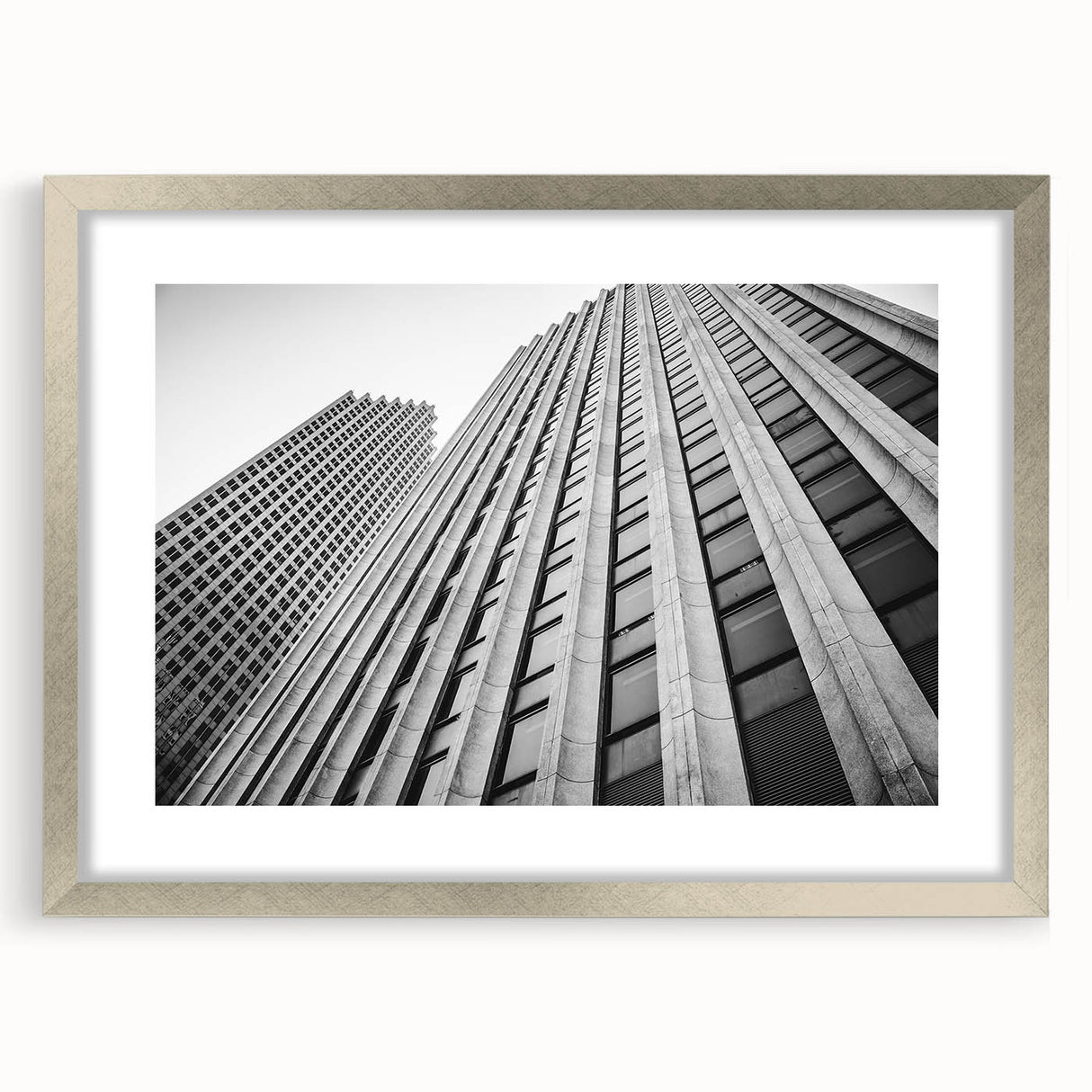 Textured abstract art print of the Houston skyline, in muted gray tones on a framed canvas, ideal for bedroom wall decor.