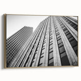 Framed canvas featuring a vintage-style landscape painting of the Houston skyline in muted gold and black tones.