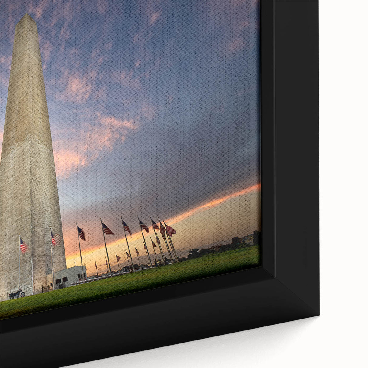 Black wall art featuring a textured close-up of the Washington DC monument in vibrant colors on a framed canvas.