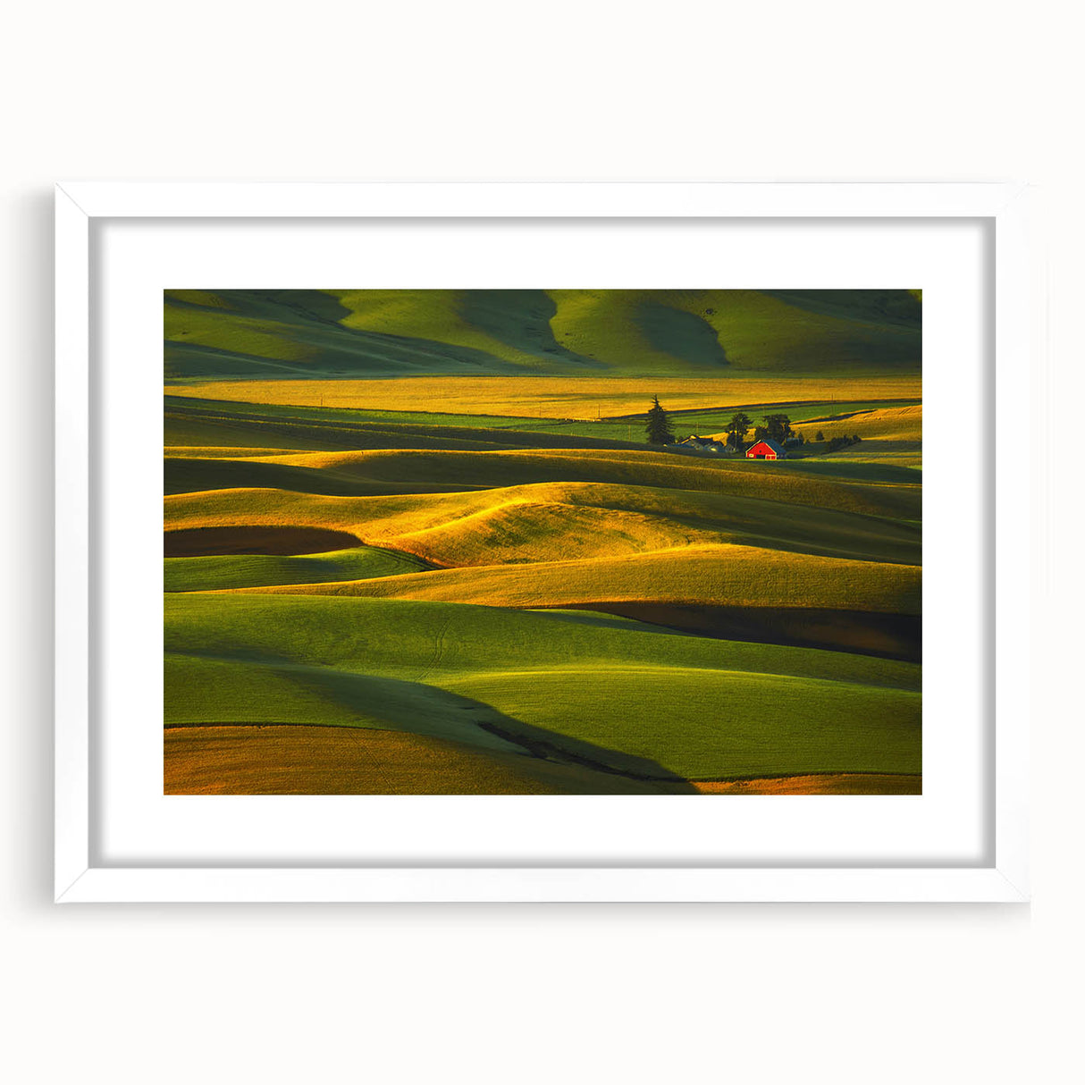 Abstract art print of Palouse fields in muted green and yellow tones on a white-framed mat, ideal for dining room decor.