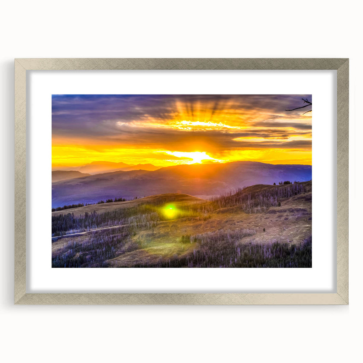 Textured art print of Yellowstone landscape in muted earth tones, framed in silver, ideal for bedroom art.