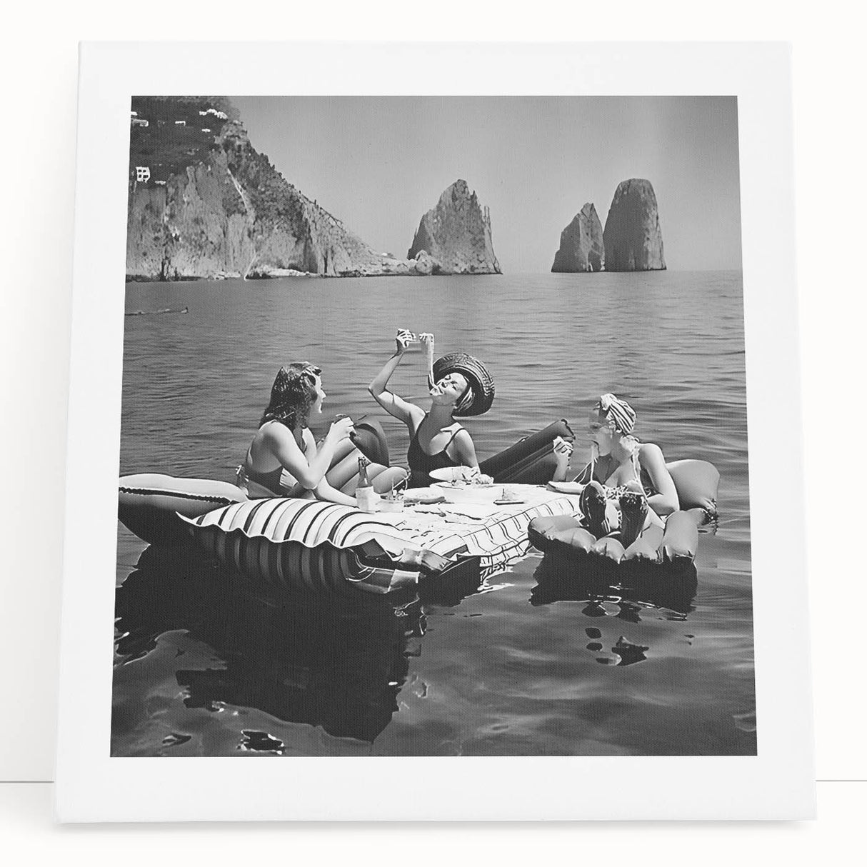 Black and white stretched canvas featuring an abstract design of people dining, ideal for kitchen wall art.